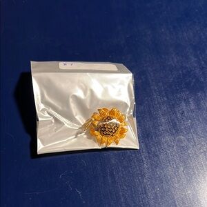 Gold and Black Heart Brooch with Ribbon Detail